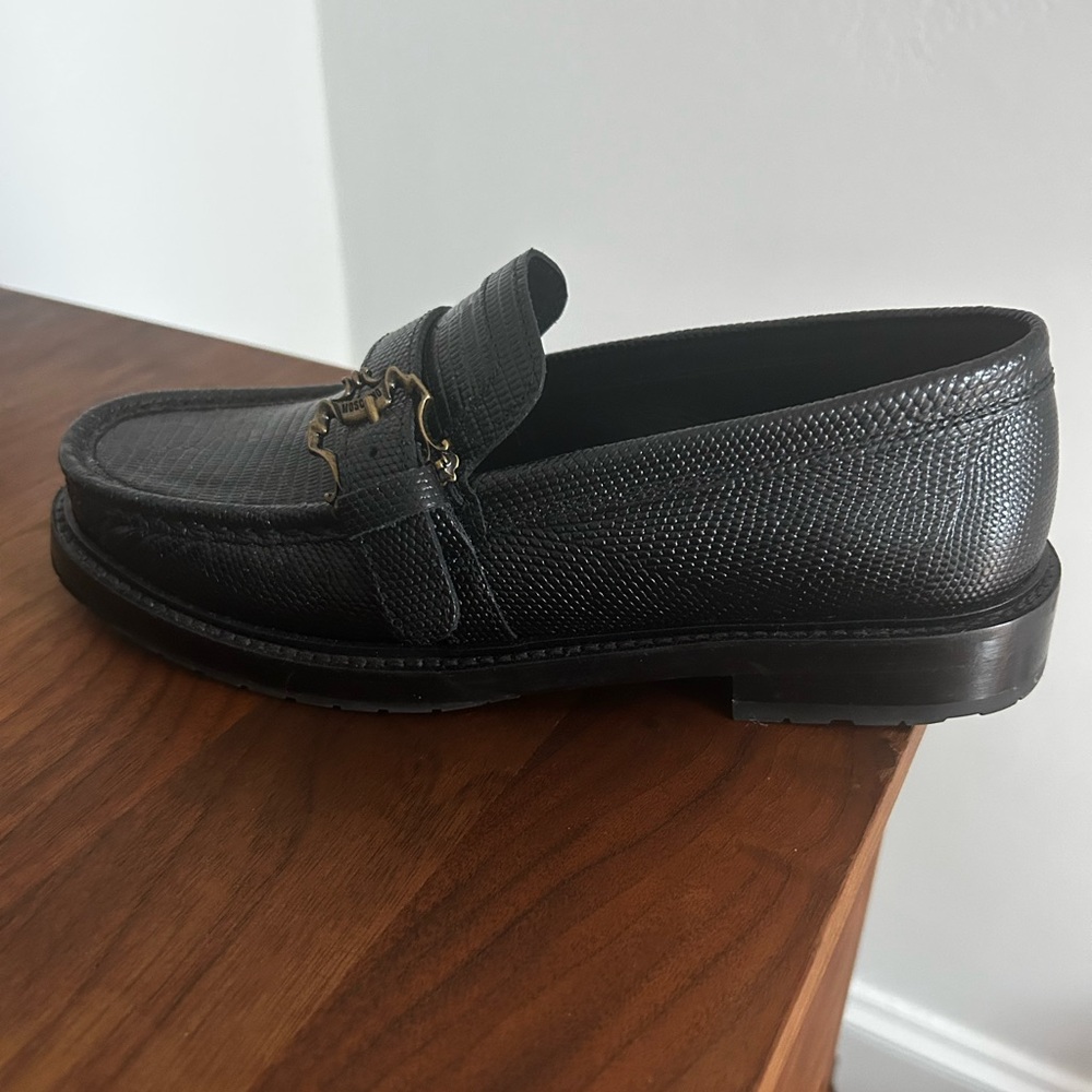 Moschino Black Flats with Timeless Elegance